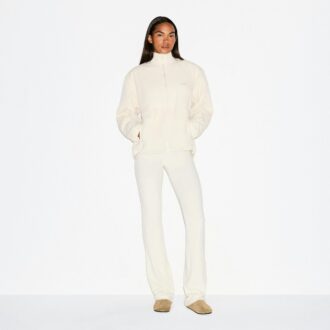 TEDDY OVERSIZE’OWY BLUZA Z ZAPIĘCIEM NA PÓŁ ZAMEK